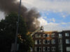 Acht woningen ontruimd na grote brand aan Stadhoudersweg in Rotterdam