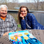 22juli-Inge-de-Bruijn-met-haar-coach-Paul-Bergen-en-haar-Olympische-medailles