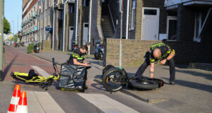 Fietsers botsen op Rotterdamsedijk in Schiedam thv grens Rotterdam, één gewonde en aangehouden