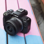 EOS_R50-ambient-high-angle-black-camera-bench